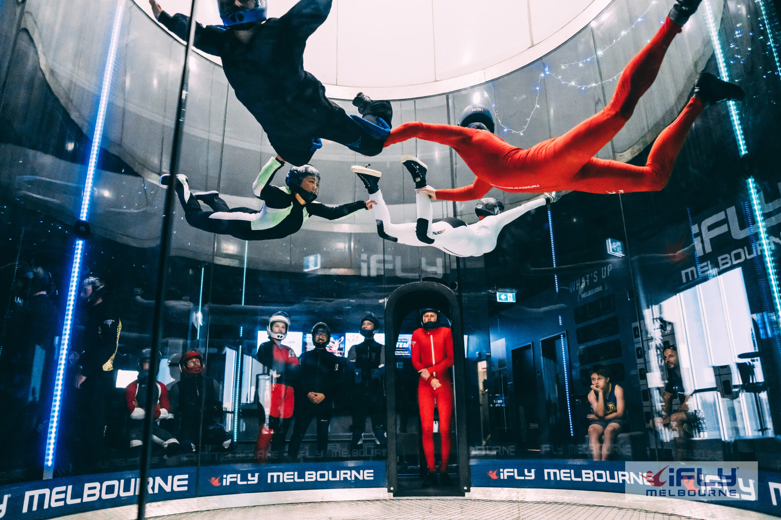 iFly Melbourne with group of four flyers performing